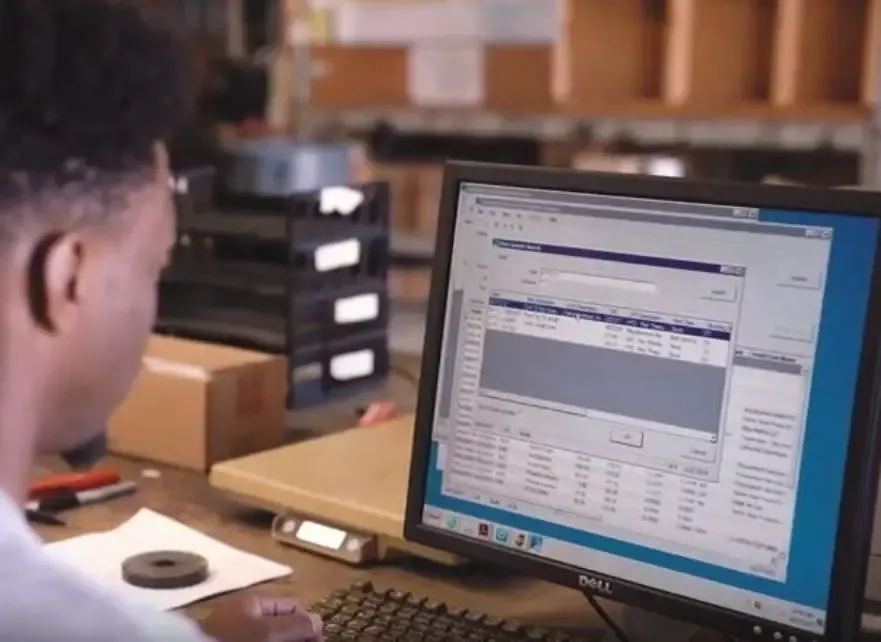 person on computer